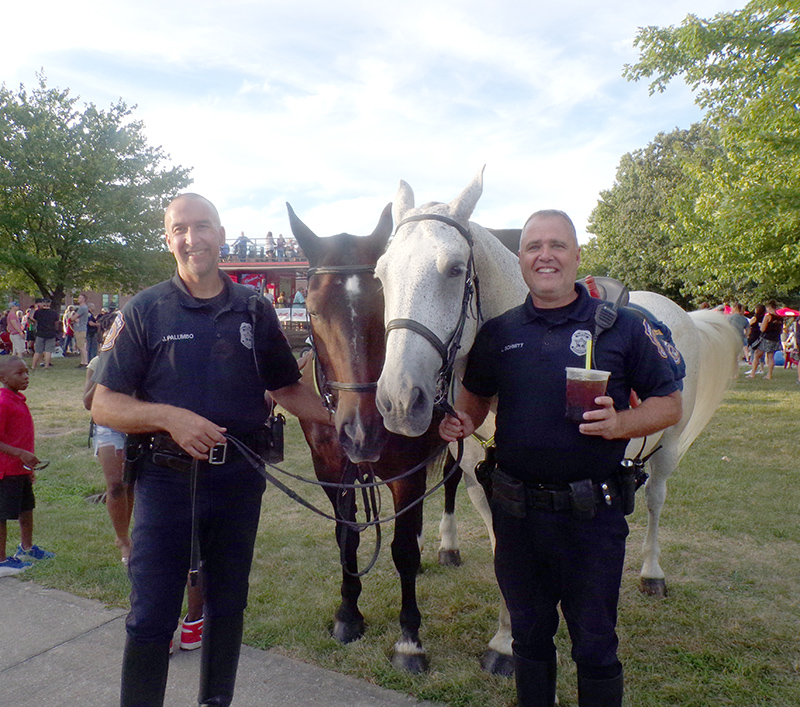 IMPD officers Palumbo and Schmitt with horses
