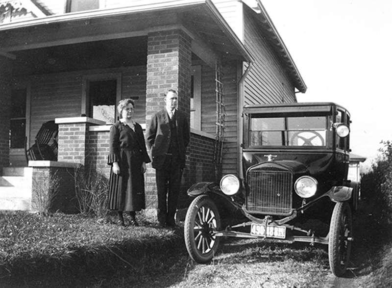 John and Nora standing at the 6148 College house. Today this is the office of Andrey M. Horton, D.D.S.