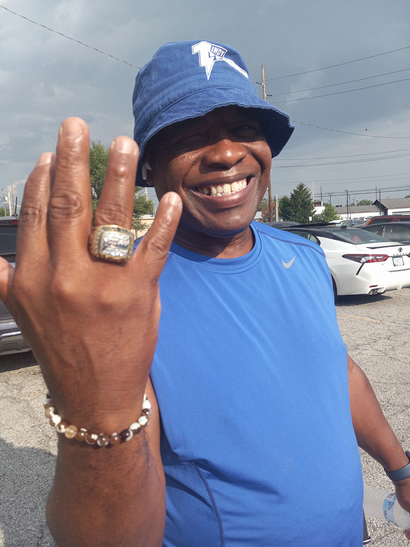 Coach Darnell Booker showing off his Championship ring