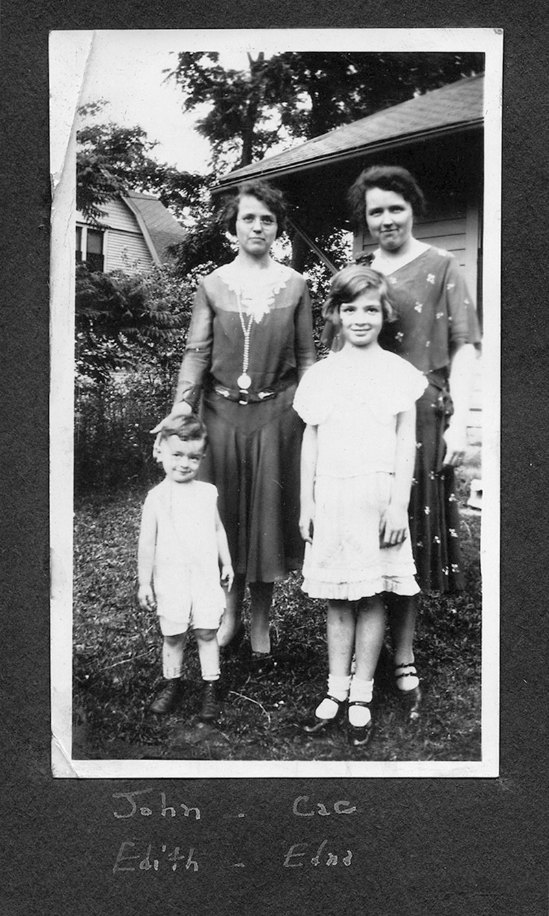 The twins Edith and Edna with Edna's daughter Cac and her cousin John D. Hague. Taken at the 61st and Carrollton Avenue house.
