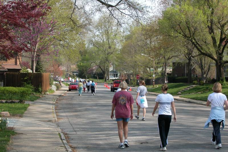 Walkers just a few blocks from the finish line on Broadway Street