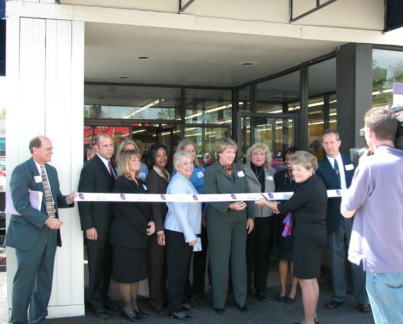 Ann DeLaney Cutting the ribbon