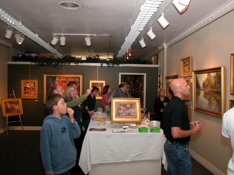 All ages enjoyed the paintings of Broad Ripple by Indiana artist Randall Scott Hardens at Sigman's Gallery on the corner of Winthrop and Broad Ripple Avenue.