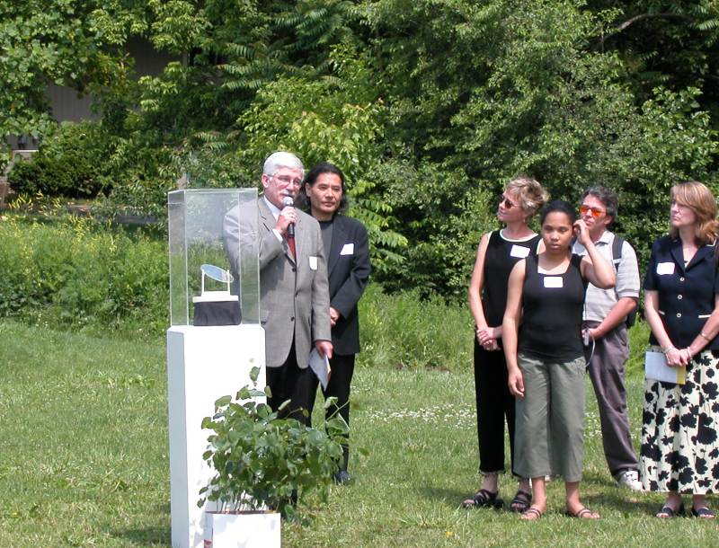 Jim Durst, Indiana School for the Blind superintendent with master artist Sadashi Inuzuka and a model of Sadashi's art installation.