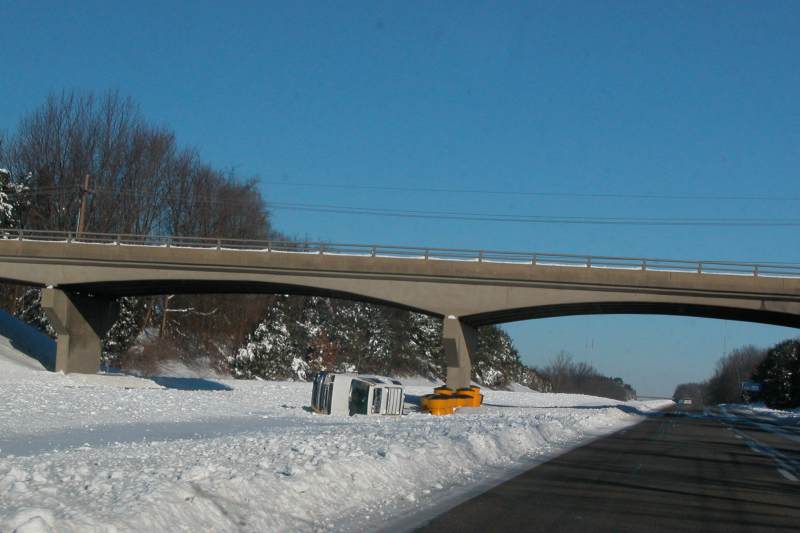 One of several flipped and stranded vehicles along I-65 on the route to Columbus.