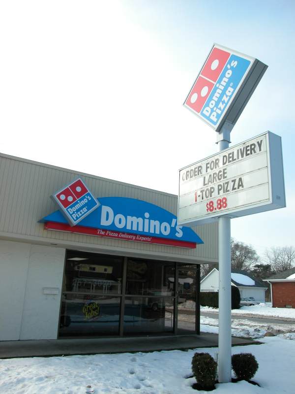 Domino's Pizza, just east of the Village on 62nd Street offers carry-out or delivery.