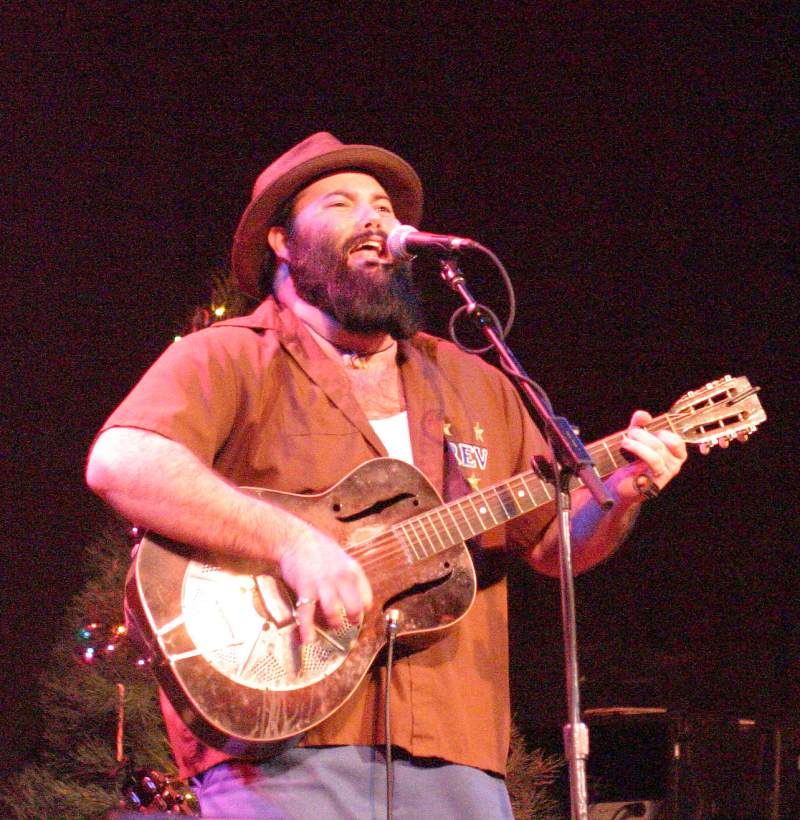 Reverend Peyton on dobro of Rev. Peyton's Big Damn Band.