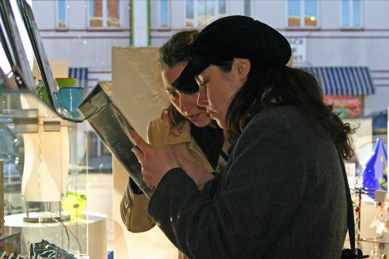 Customers Aris Bruner and Naomi Milstein checking out the new gift items at Artifacts.