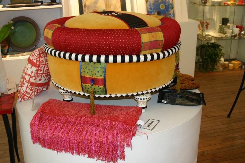 A colorful ottoman by artist Robert A. Harman.