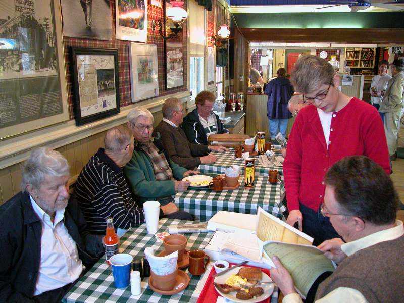 Earl Anderson (first on left), Les Duvall (green jacket), Bob Alloway (far end), Elizabeth Hague talking to Bob Hessong.