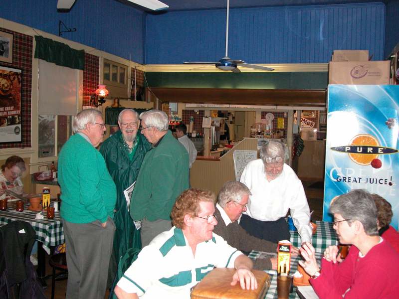 Standing: Paul Walker, Phil Walker, Les Duvall (green jacket). Seated: Bob Alloway talking to Elizabeth Hague.