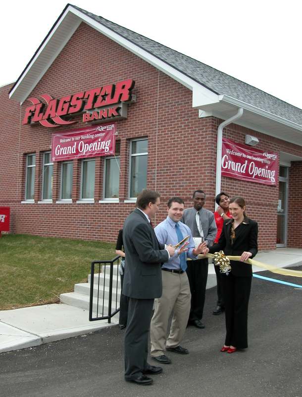 Michael Hylton handed the scissors to Flagstar branch manager Bret Henderson.