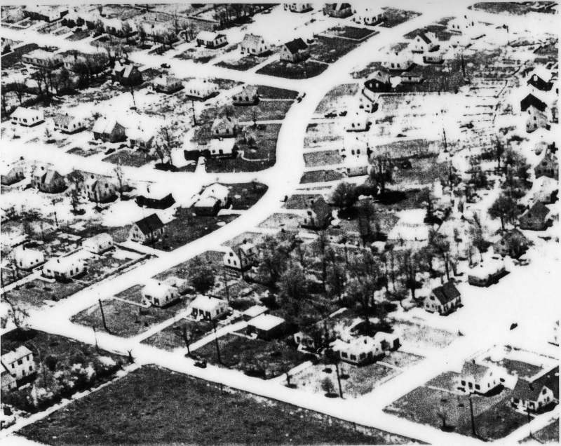 This aerial photo of Keystone Heights was taken in the 1950s. The road near the bottom is Keystone. The curving road is 69th Street. West is toward the top and south is to the left.