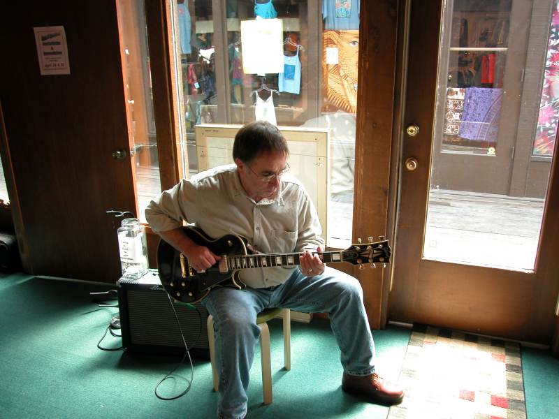 Jazz guitarist Barney Quick and gallery owner Jeri Cannon played at the grand opening of Cannon Gallery.