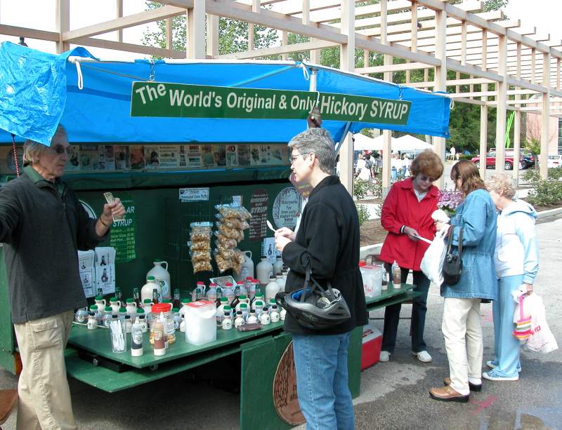 Gordon Jones of Hickoryworks explained the syrup to Elizabeth.