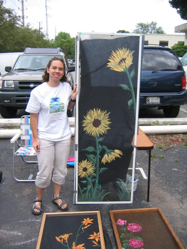 Lindsay Jones with one of her painted screens.