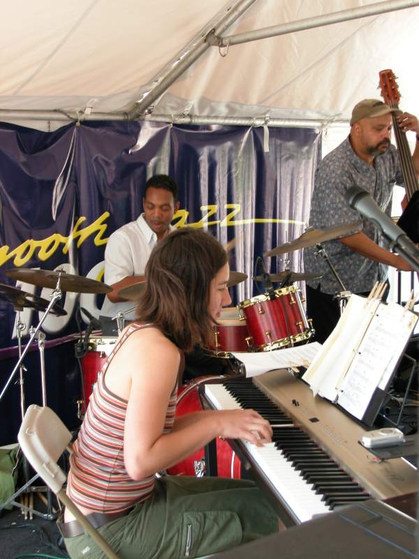 Mina Keohane (on piano) performed her compositions on the Cafe Stage. Kenny Phelps on drums and Frank Smith on Bass accompanied.