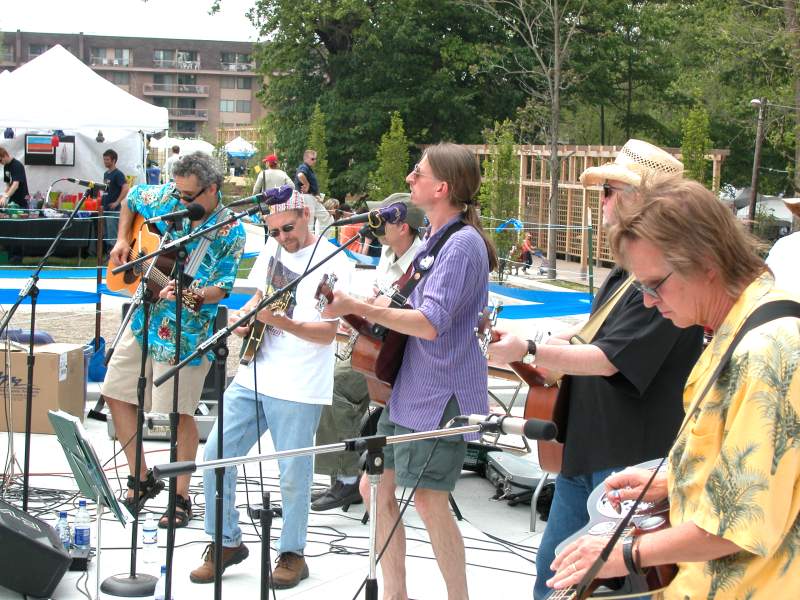 Greg Ziesemer (center) performed on the Sculpting Court Stage in the folk/bluegrass band Spud Puppies.