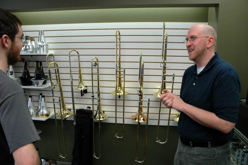 Matthew Altizer described the range of trombones available in the store.