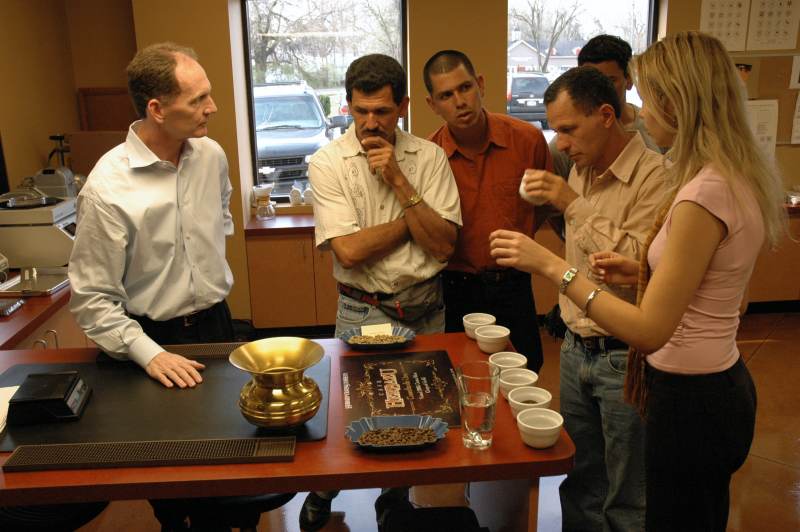 Rick Hubbard (left) presented samples of the roasted Café Herbazu beans for tasting.