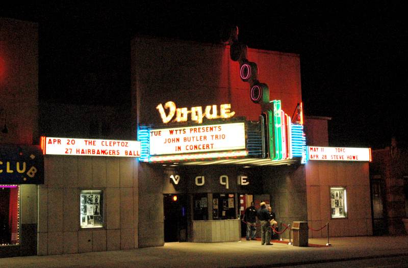 At the Vogue, much of the blue neon in front, and many of the pink and green rings were broken by the hailstones.