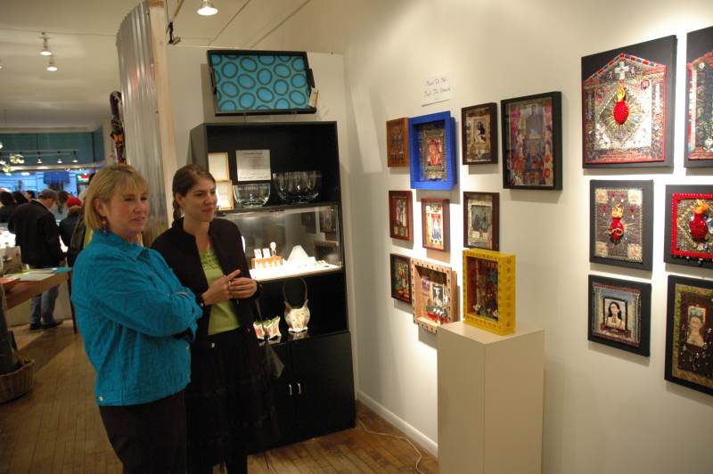 Bernadette Ostrozovich (left) displayed her collage art at Artifacts.