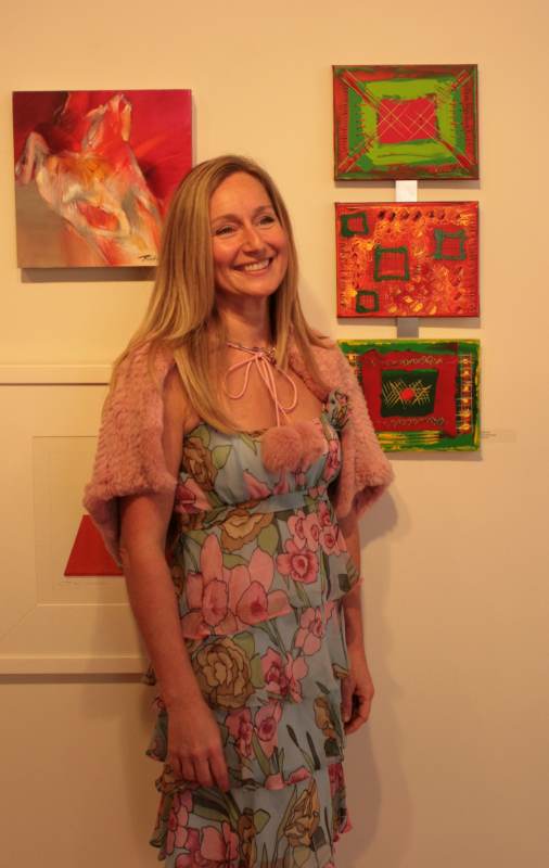 Martine Bachelart from Belgium, lit up the room with bright art and her smile.