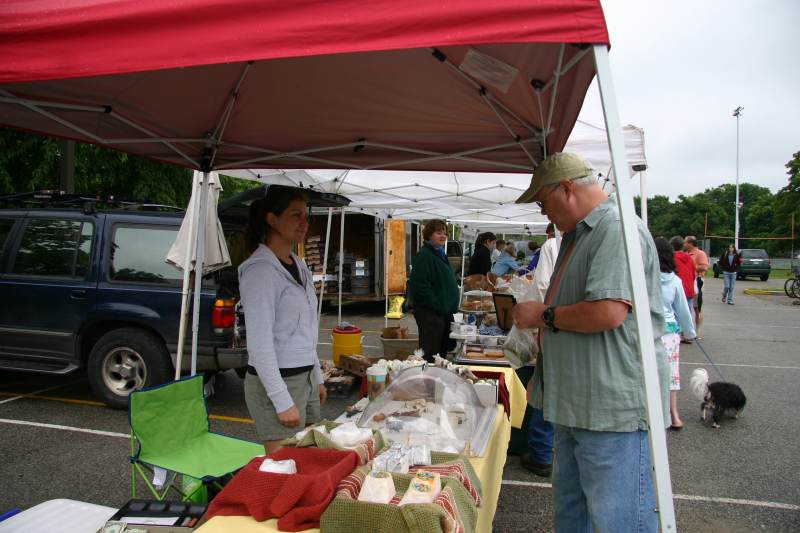 Tom Yost is sampling goat cheese from Svida Paskalevska of Capriole,Inc. and he took some home.