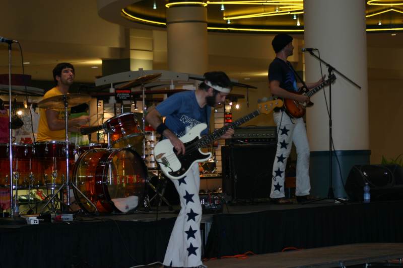 Derrek Berk (drums), Josh Malerman (lead guitar), and Chad Stocker (bass) of The High Strung. The Detroit band played a free concert at Glendale as part of the IMCPL entertainment series.