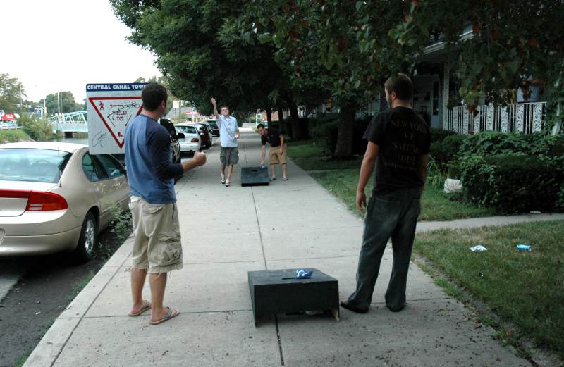 nearby residents played corn hole