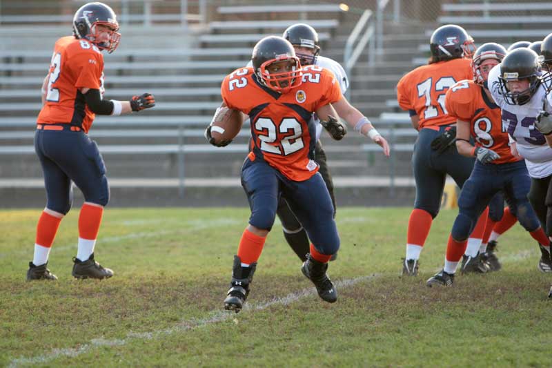 #22 Kiva Thomas making her way down the field against Toledo.