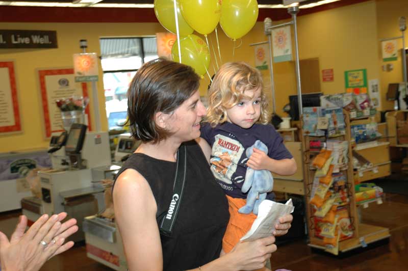 This young lady won for the tallest sunflower.