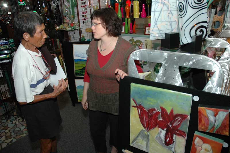 At Chelsea's, Sheri Voigt discussed her paintings with Michele Borgerhoff.
