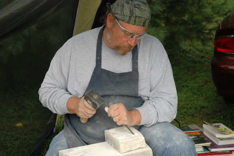 Limestone artist J. David Arnold carved during the festival