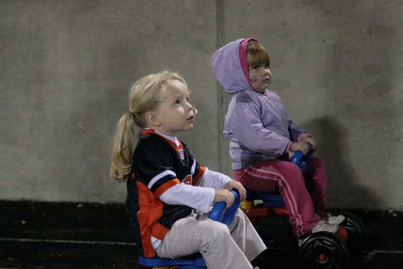 A tense moment during the halftime kiddie cart race.
