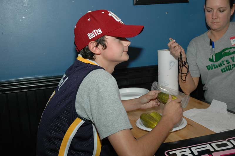 Broad Ripple Bagel Deli pickle contest raises money for kids in need: Two-time champ beats her own record - by Ashley Plummer