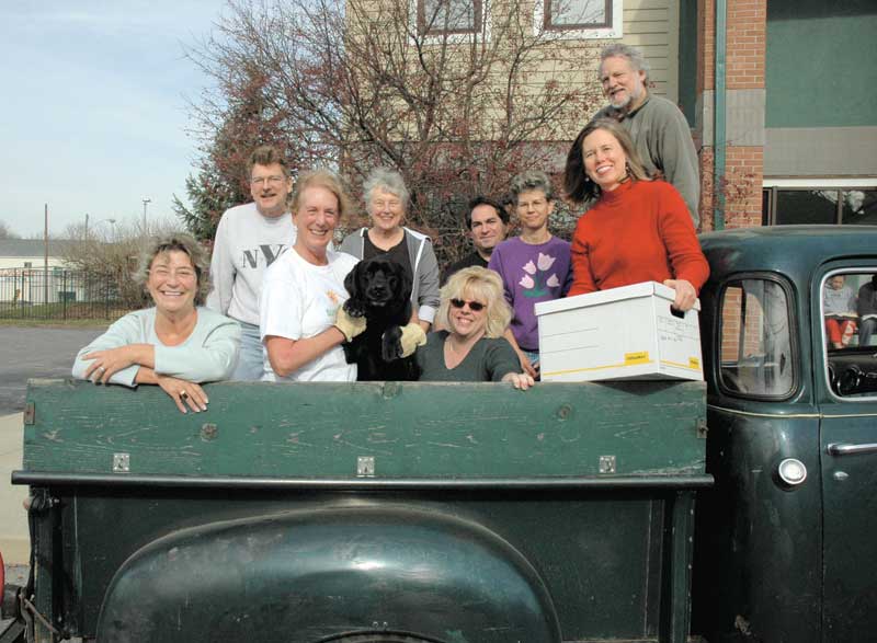 (L to R) Ellen Morley Matthews, Peter Dean, Julia Merkt (with doggie A.J.), Diane Seybert, Sandy Arnold, Rich Bees, Kathy Kist, Sharon Butsch Freeland, Michael Freeland.