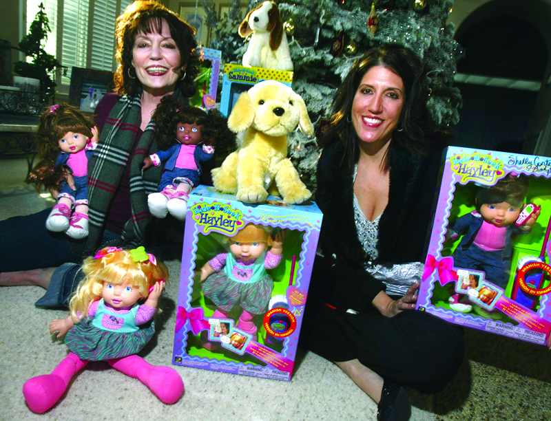 Cindy Reichman and Shelly Conte with their dolls. (Photographer Eric Paul Zamora © THE FRESNO BEE, 2006)