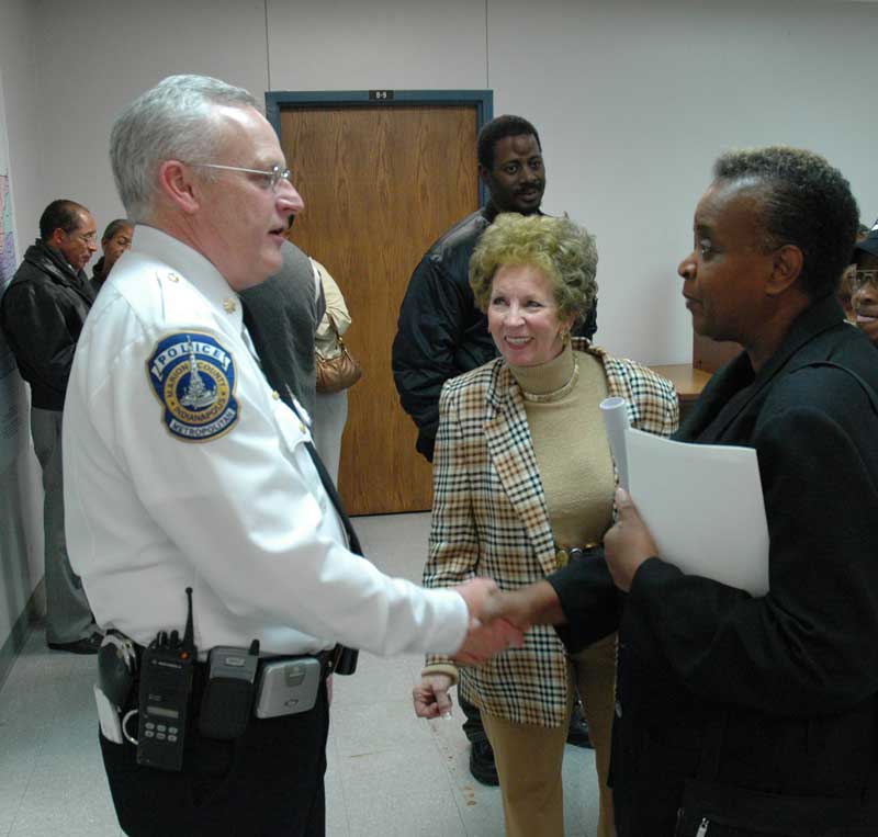 Major John Conley meets with Callie Sanders, President of the Butler Tarkington Neighborhood Association (BTNA) (right) and Caroline Farrar, executive director of Meridian-Kessler Neighborhood Association (MKNA).