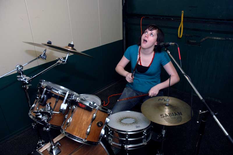 Rachael in the Tower of Terror. You would think she had never played drums in a freight elevator before.