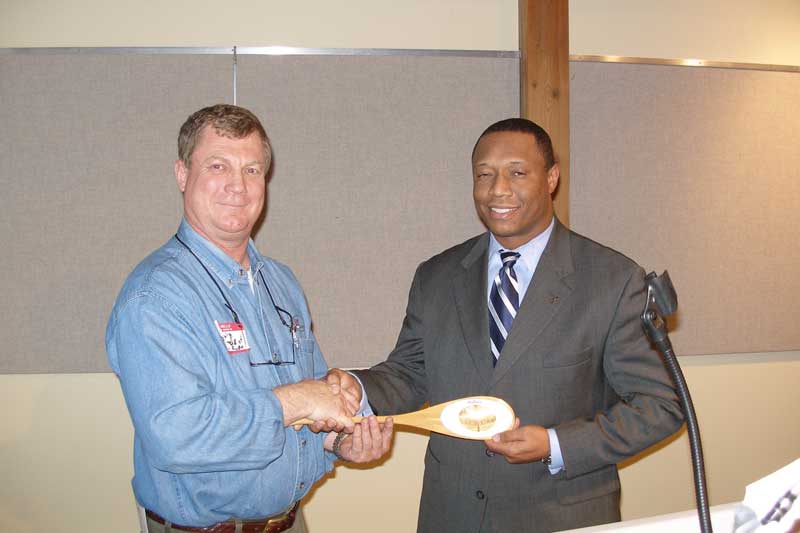 Kevin Hardie of Friends presented the award to Curtis Hollis of KeyBank.