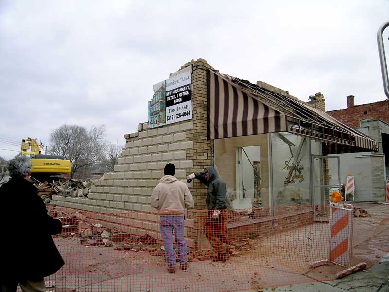 The 916 Westfield Boulevard building comes down to make way for the new retail/residential project.