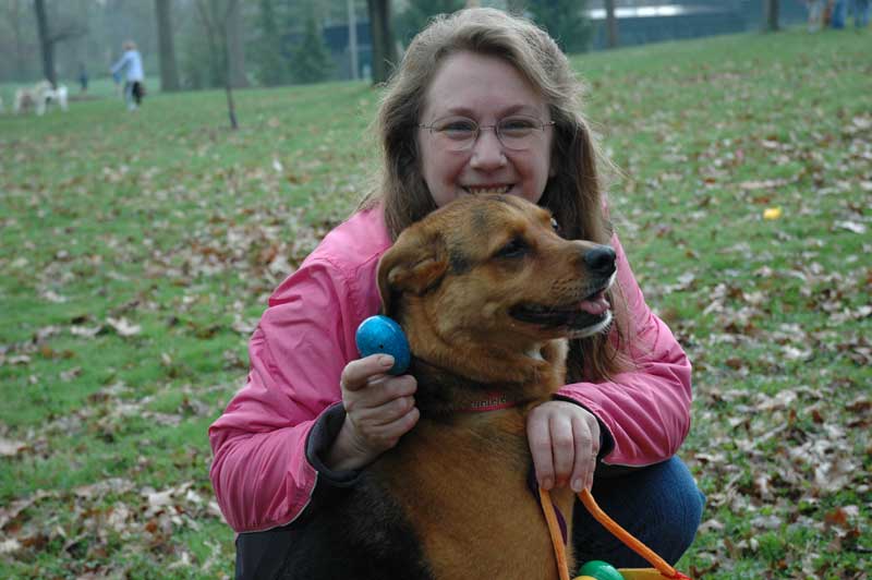 Abby and her proud owner display one of her golden finds. All proceeds from the Begg Hunt benefited the ARPO.