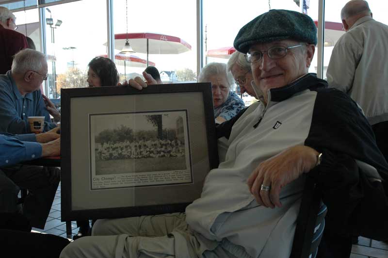 Dan Mohler, class of 1956 with his BRHS baseball team photo. In 1956 Broad Ripple won the championship.