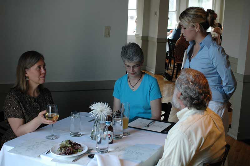 Sharon Butsch Freeland, Elizabeth Hague, and Michael Freeland at the dinner.