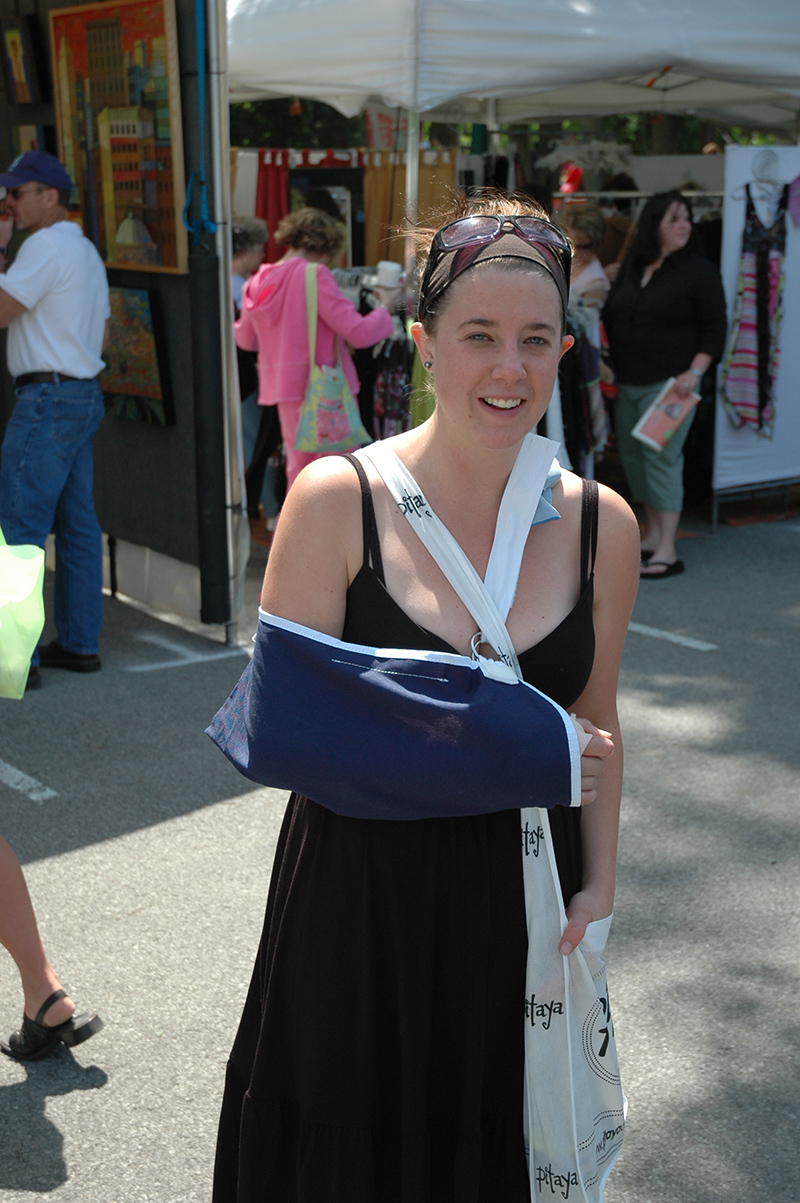 Associate Editor Ashley Plummer in a cast at the fair