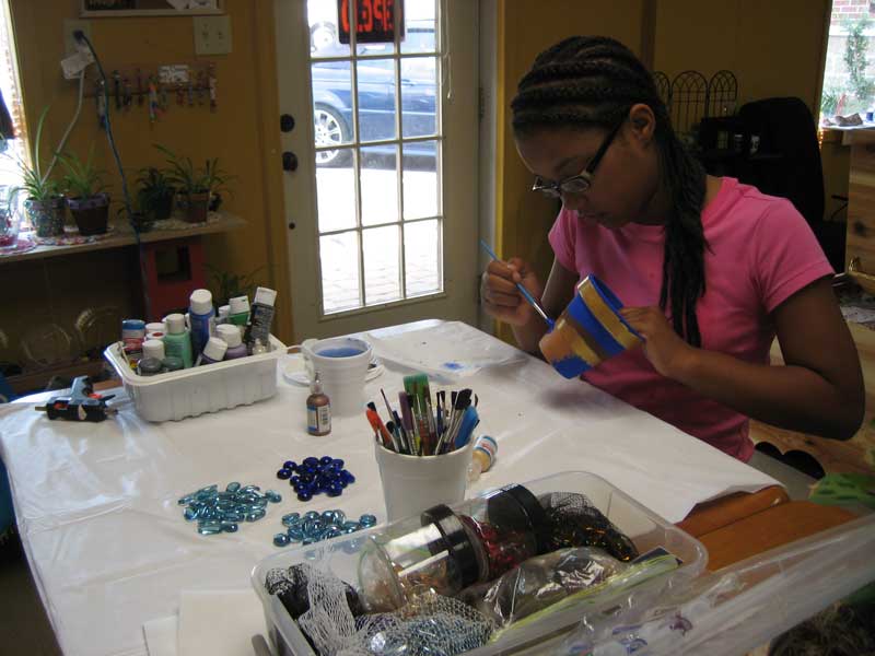 Kelsey working on a project at Coffee and Crafts.