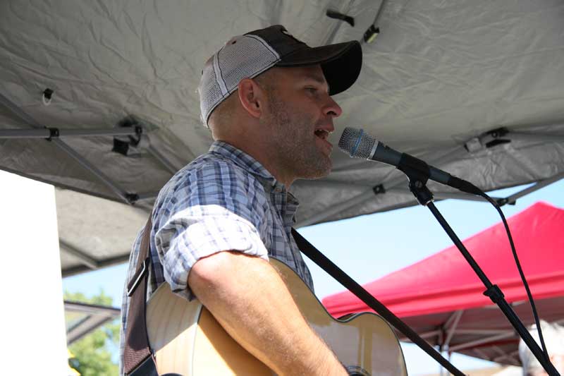 Chad Mills performed at the Broad Ripple Farmers Market. The market is held each Saturday morning in the south BRHS parking lot.