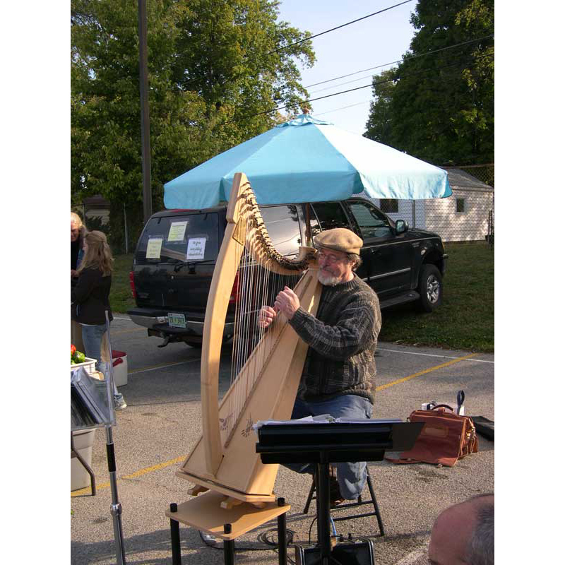 Harpist Tom Duncan performed at the Farmers' Market. www.tomduncan.net