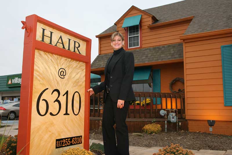 Debbie Scott stands proudly in front of her new business.